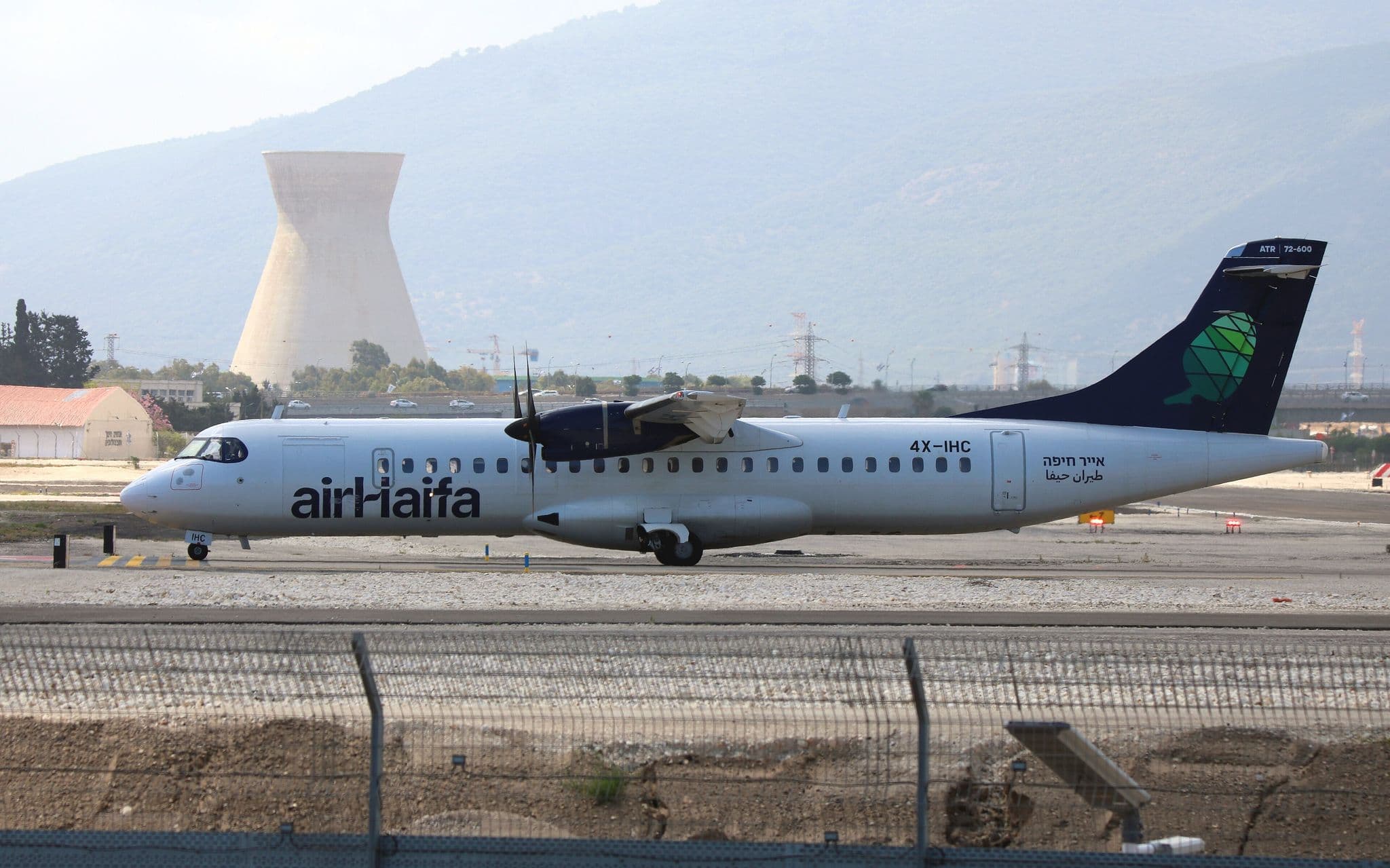 Air Haifa ATR 72-600 4X-IHC at Haifa Airport with the Carmel ridge behind
