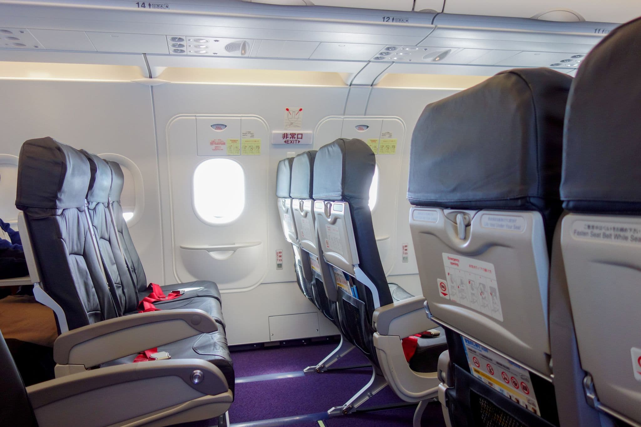 Vanilla Air A320 cabin with leather seats by the exit row