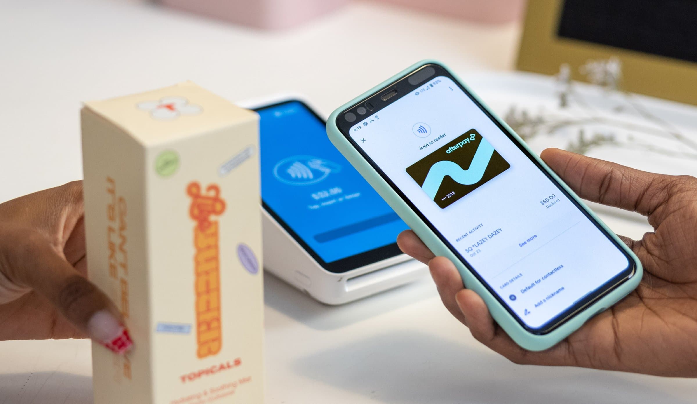 Paying in store by tapping a phone at a card terminal with Afterpay