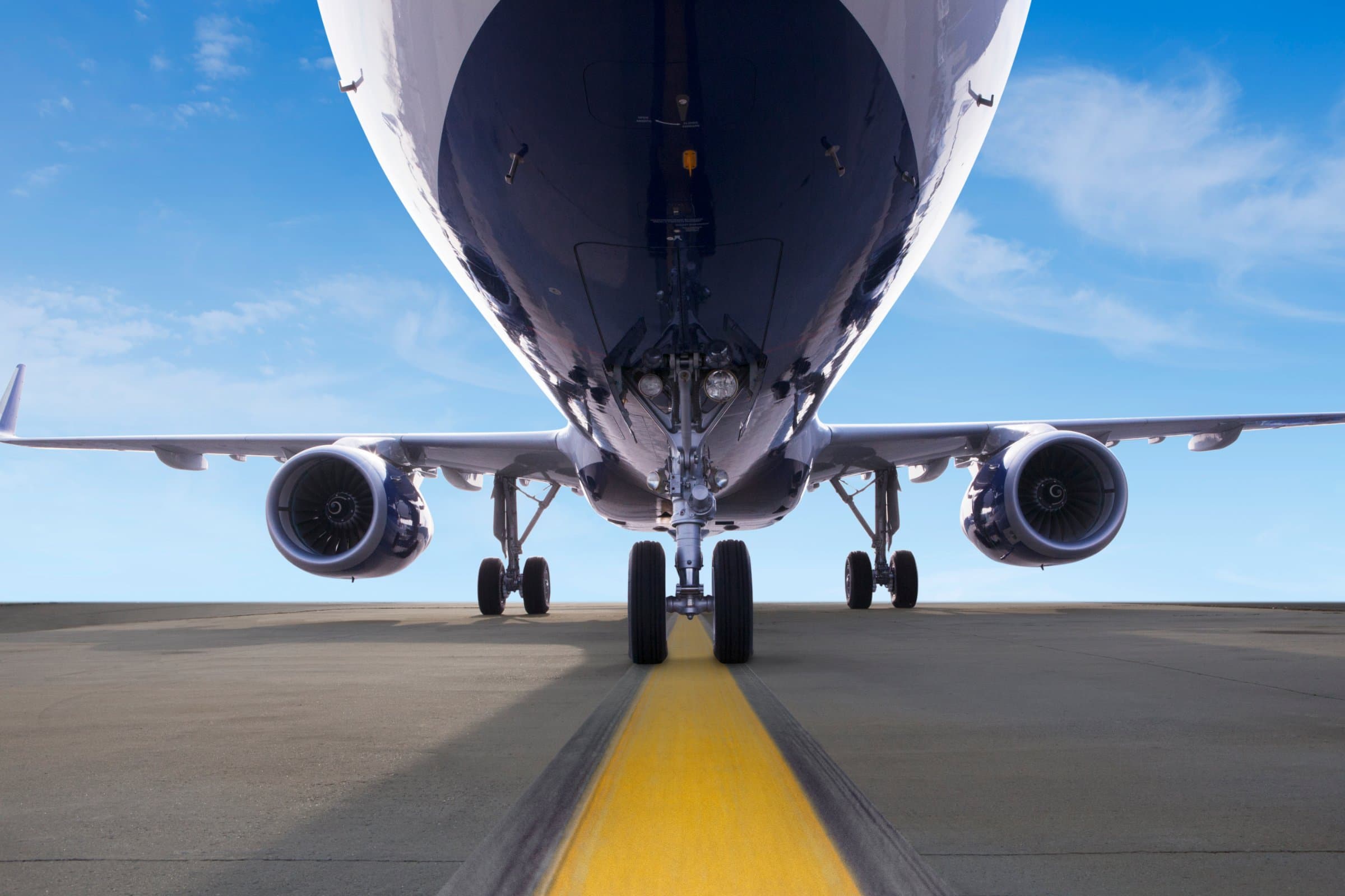 JetBlue aircraft parked on the tarmac at the gate