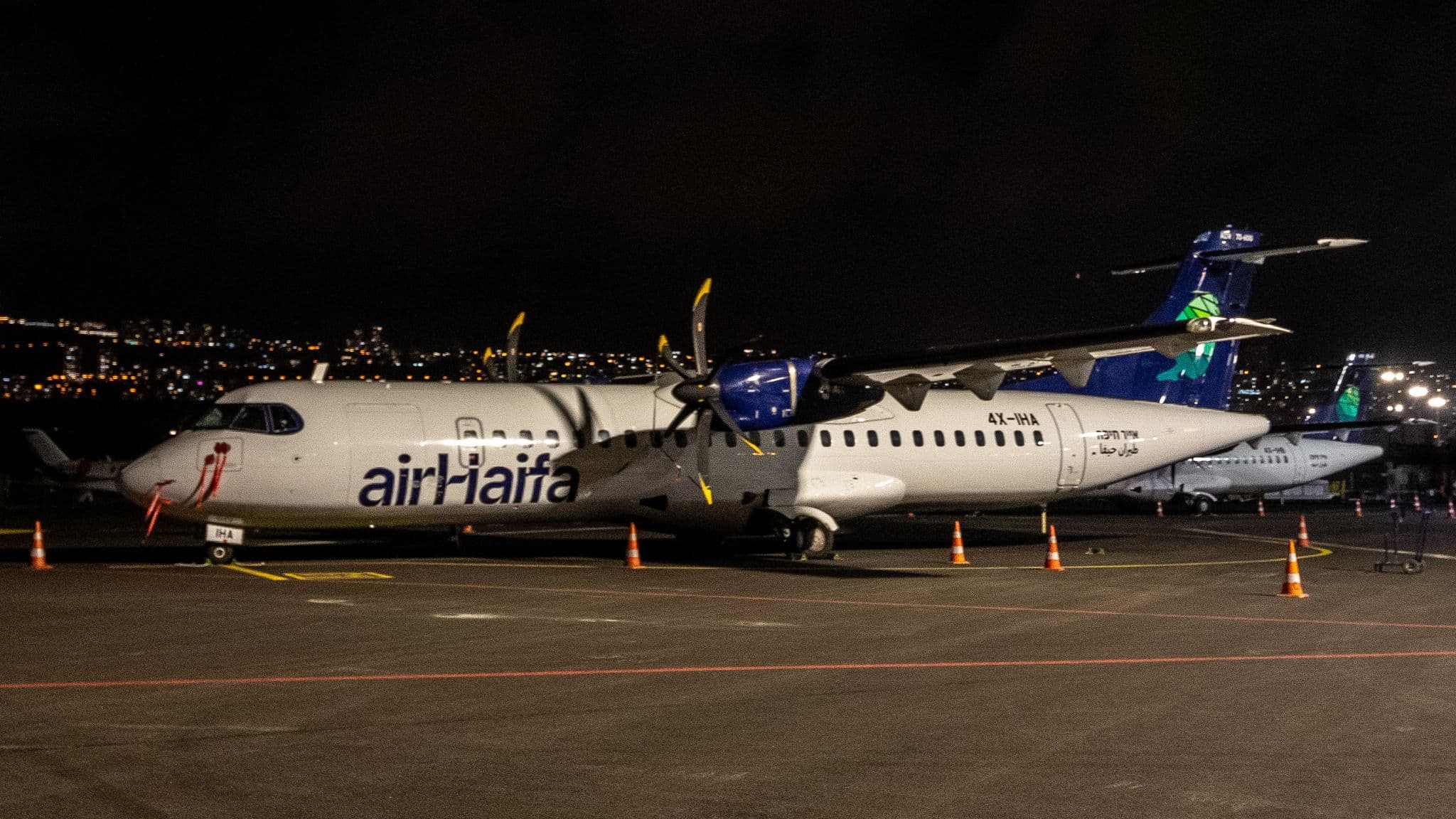 Air Haifa ATR 72 parked at night at Haifa Airport