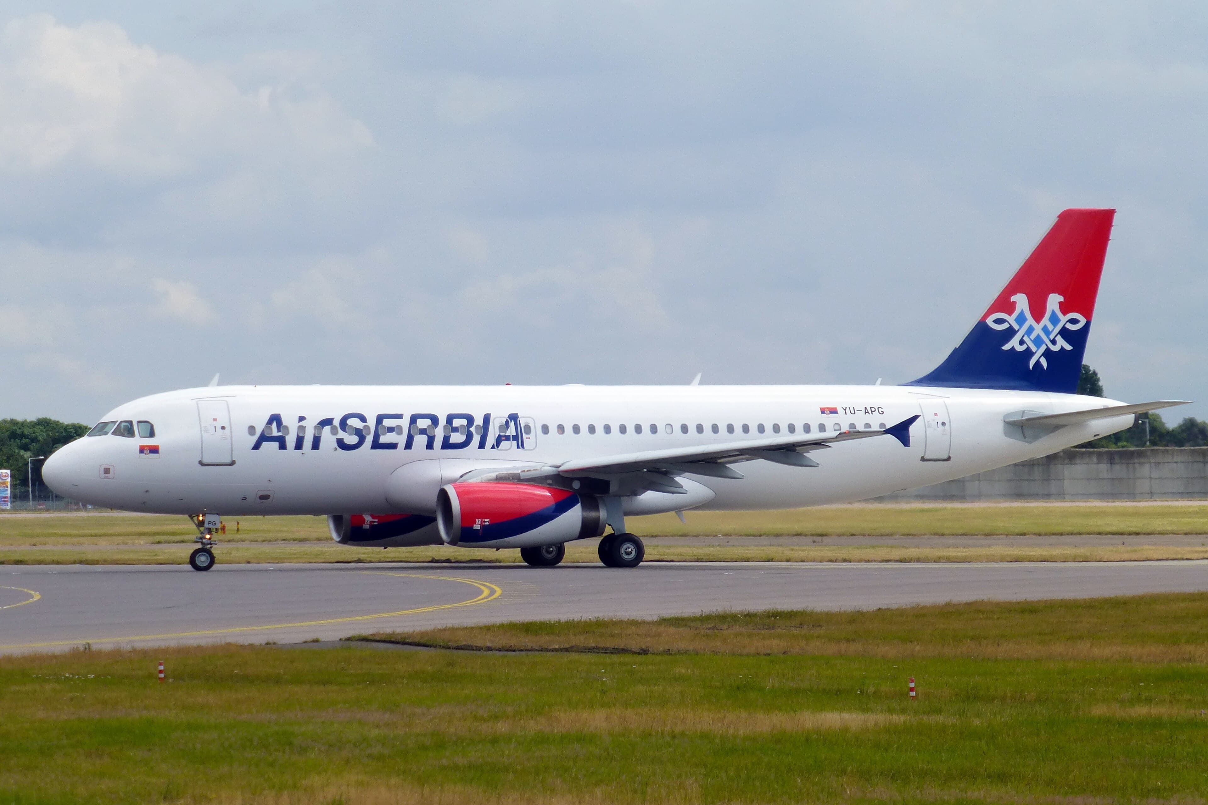Air Serbia Airbus A320 YU-APG lining up on the runway at London Heathrow