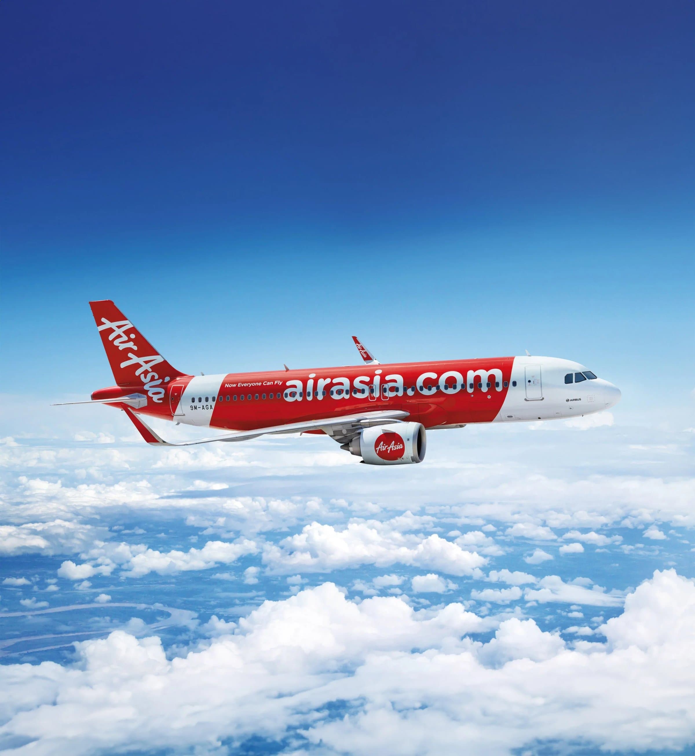 AirAsia Airbus A320 flying above the clouds