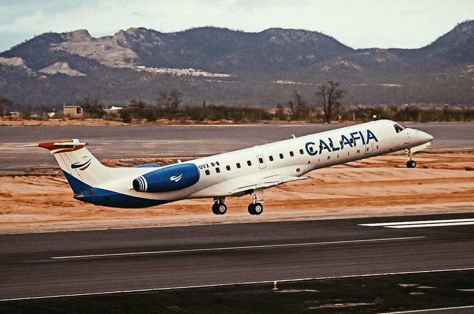 Calafia Airlines Embraer ERJ-145ER taking off with desert mountains behind