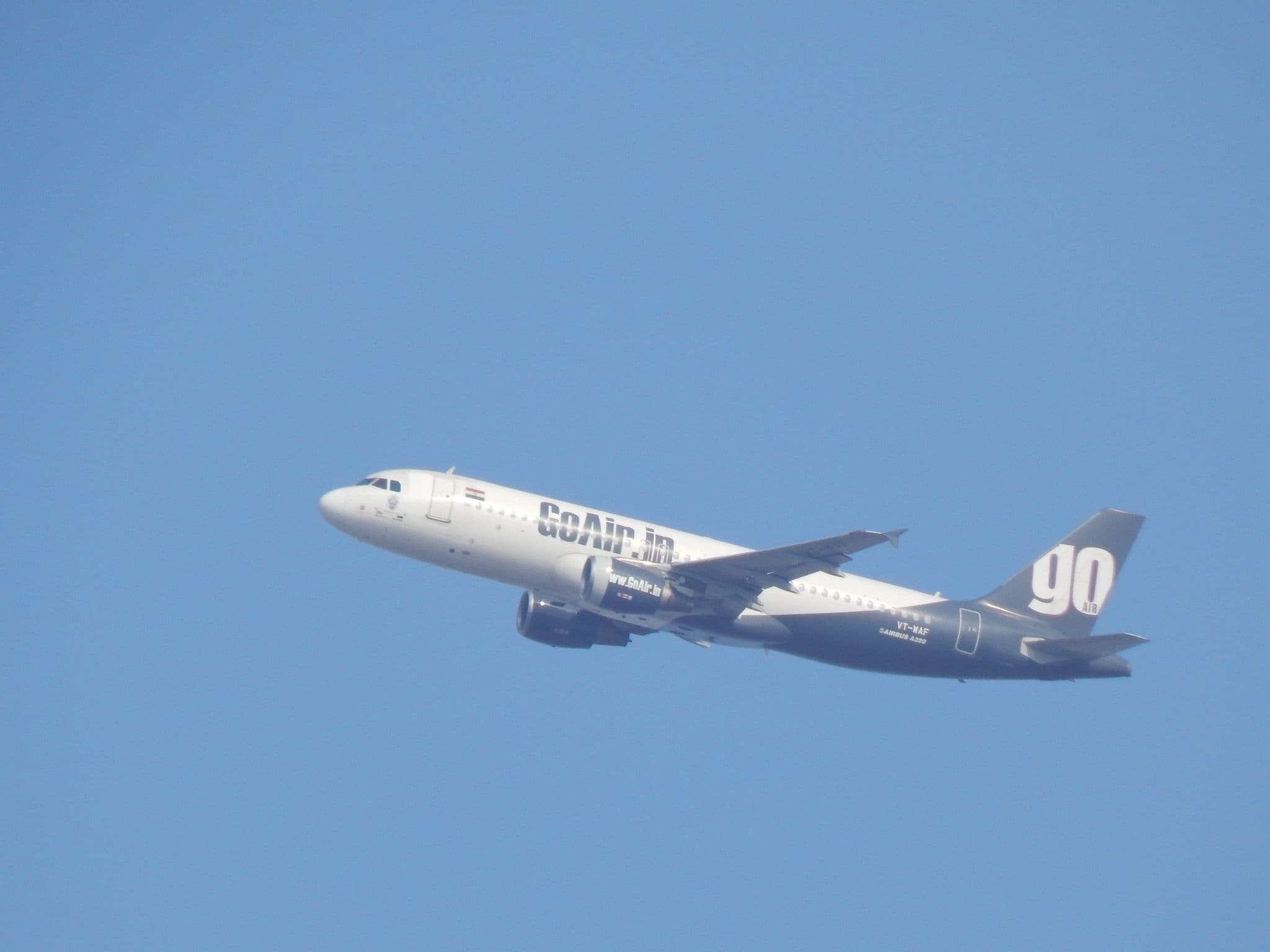 GoAir (now Go First) Airbus A320 in flight over Jammu Airport